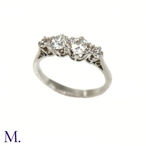 53 - A Diamond 4-Stone Ring

The platinum ring is set with four bright old cut diamonds (estimated colour... 