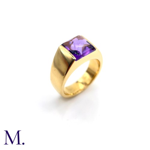 57 - An Amethyst Tank Ring by Cartier.

The 18ct yellow gold ring is marked for Cartier and 18ct gold, an... 