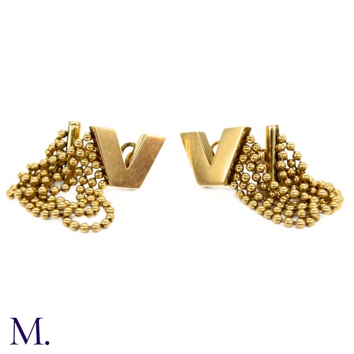 60 - A Pair of 18ct Gold Earclips by Versace

The 18ct yellow gold earclips by Versace have the iconic 'V... 