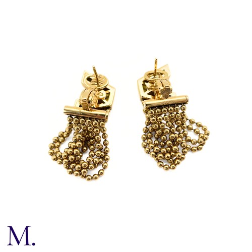 60 - A Pair of 18ct Gold Earclips by Versace

The 18ct yellow gold earclips by Versace have the iconic 'V... 