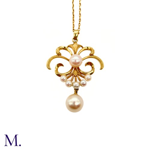 70 - A Pearl Pendant and Chain

The 14ct yellow gold chain supports a 14ct yellow gold pendant (approx. 3... 