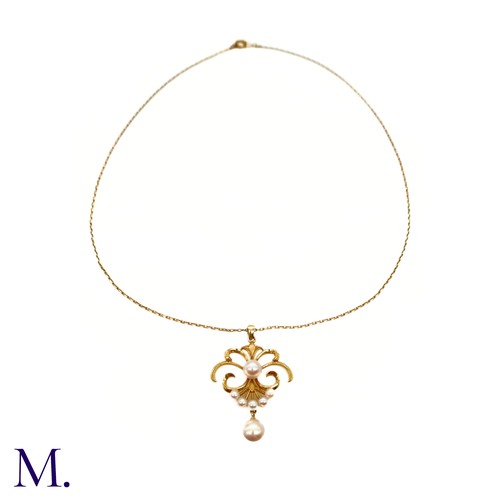 70 - A Pearl Pendant and Chain

The 14ct yellow gold chain supports a 14ct yellow gold pendant (approx. 3... 