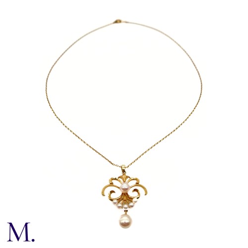 70 - A Pearl Pendant and Chain

The 14ct yellow gold chain supports a 14ct yellow gold pendant (approx. 3... 