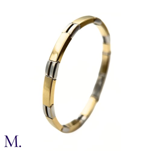 69 - A Roberto Bravo 2-Colour Gold Bangle Bracelet

The  bracelet is made up of alternating 14ct white an... 