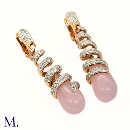 63 - A Pair of Pink Quartz and Diamond Earrings by Grisogno

The 18ct yellow gold earrings are designed i... 