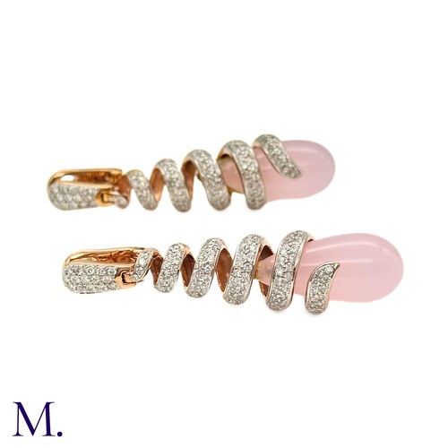 63 - A Pair of Pink Quartz and Diamond Earrings by Grisogno

The 18ct yellow gold earrings are designed i... 