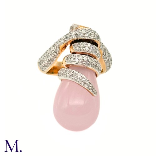 62 - A Pink Quartz and Diamond Ring by Grisogno

The 18ct yellow gold ring takes an open swirling form an... 