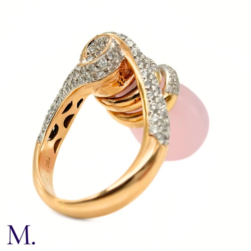 62 - A Pink Quartz and Diamond Ring by Grisogno

The 18ct yellow gold ring takes an open swirling form an... 