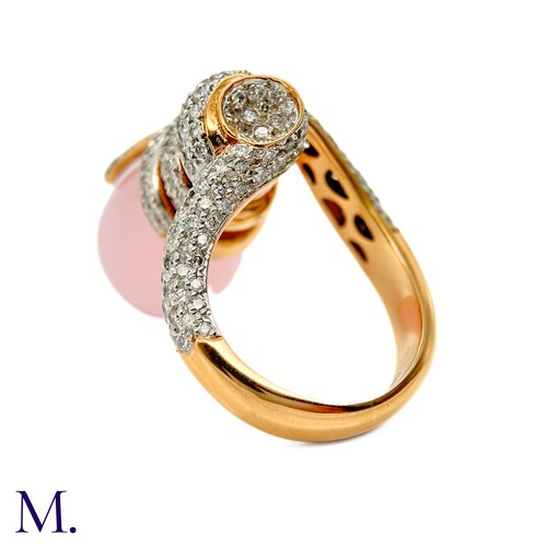 62 - A Pink Quartz and Diamond Ring by Grisogno

The 18ct yellow gold ring takes an open swirling form an... 