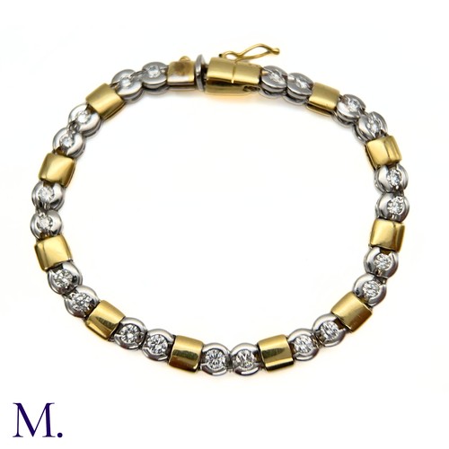 66 - A Two-Colour Gold and Diamond Bracelet

The 18ct gold bracelet is made up of square yellow gold and ... 