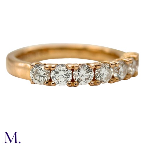 45 - A Diamond ring by Browns 

The 18ct yellow gold band is set with seven brilliant cut diamonds weighi... 