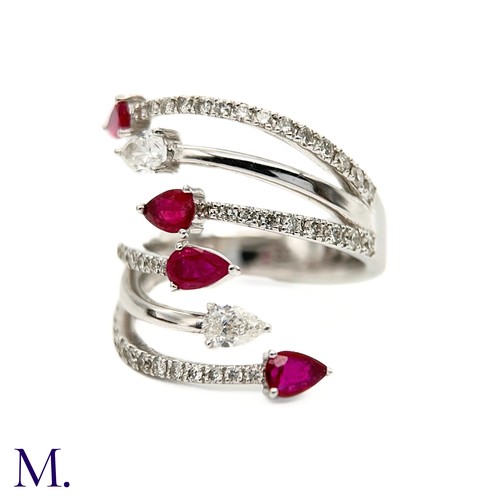 43 - A Ruby Diamond Dress Ring

The 18ct white gold dress ring is set with two pear cut diamonds weighing... 