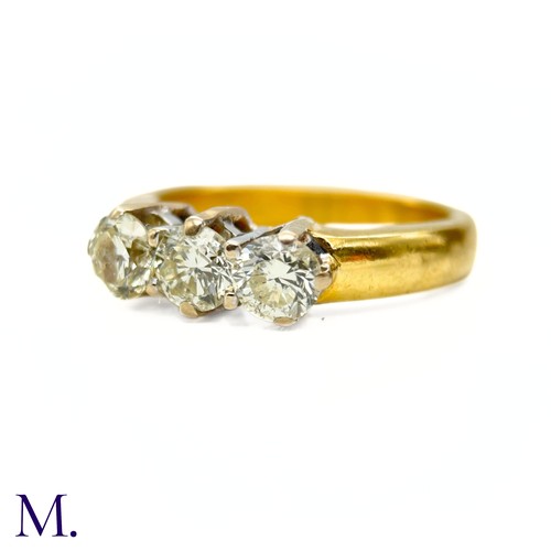 65 - A 3-Stone Diamond  Ring

The 18ct yellow gold ring is set with three round cut diamonds, each weighi... 