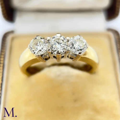 65 - A 3-Stone Diamond  Ring

The 18ct yellow gold ring is set with three round cut diamonds, each weighi... 