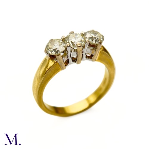 65 - A 3-Stone Diamond  Ring

The 18ct yellow gold ring is set with three round cut diamonds, each weighi... 