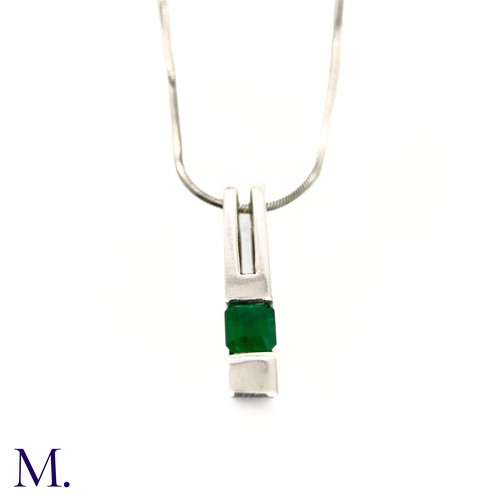 68 - An Emerald Pendant and Chain

The 18ct white gold pendant (approx 25x5mm) is set with a good colour ... 