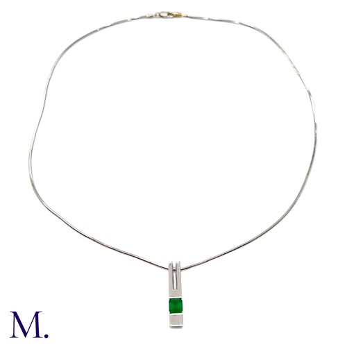 68 - An Emerald Pendant and Chain

The 18ct white gold pendant (approx 25x5mm) is set with a good colour ... 