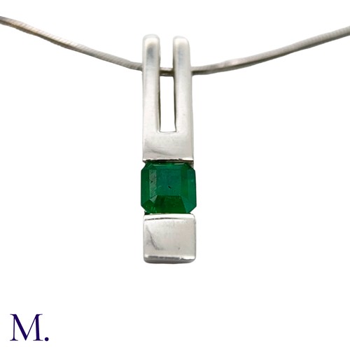 68 - An Emerald Pendant and Chain

The 18ct white gold pendant (approx 25x5mm) is set with a good colour ... 