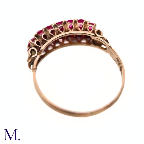 76 - An Antique Ruby Double Row Ring

The antique rose gold ring with pierced gallery is set with two row... 