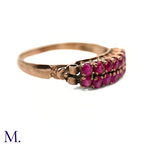 76 - An Antique Ruby Double Row Ring

The antique rose gold ring with pierced gallery is set with two row... 