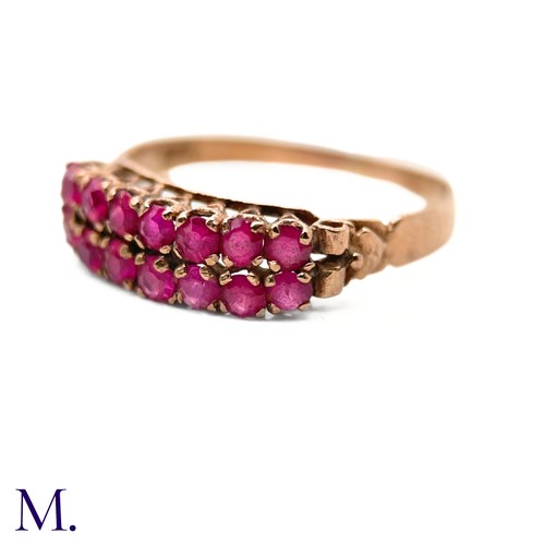 76 - An Antique Ruby Double Row Ring

The antique rose gold ring with pierced gallery is set with two row... 