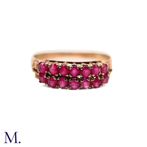 76 - An Antique Ruby Double Row Ring

The antique rose gold ring with pierced gallery is set with two row... 