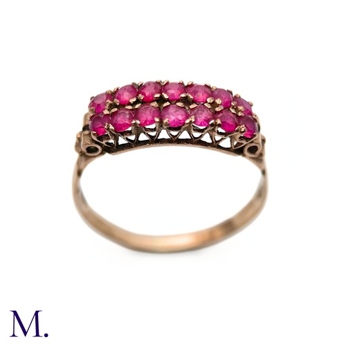 76 - An Antique Ruby Double Row Ring

The antique rose gold ring with pierced gallery is set with two row... 