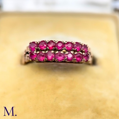 76 - An Antique Ruby Double Row Ring

The antique rose gold ring with pierced gallery is set with two row... 