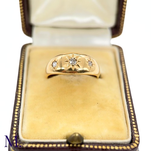 79 - An Antique 3-Stone Diamond Gypsy Ring

The gypsy ring is set with three small diamonds.  The band is... 