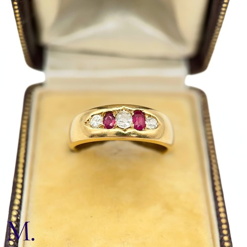 80 - A Ruby and Diamond Gypsy Ring

The 18ct yellow gold band is set with two bright rubies and three old... 