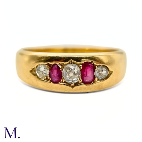 80 - A Ruby and Diamond Gypsy Ring

The 18ct yellow gold band is set with two bright rubies and three old... 