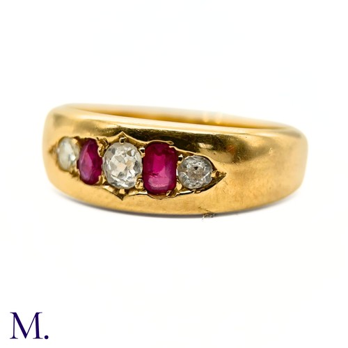 80 - A Ruby and Diamond Gypsy Ring

The 18ct yellow gold band is set with two bright rubies and three old... 