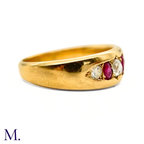 80 - A Ruby and Diamond Gypsy Ring

The 18ct yellow gold band is set with two bright rubies and three old... 