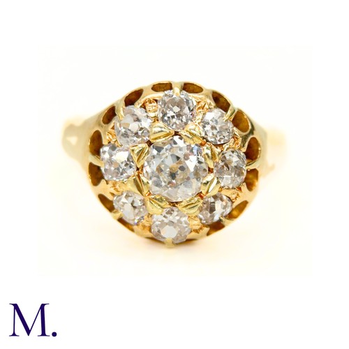 76 - A Victorian Diamond Cluster Ring. 

The antique 18ct yellow gold ring is set with nine old cut diamo... 