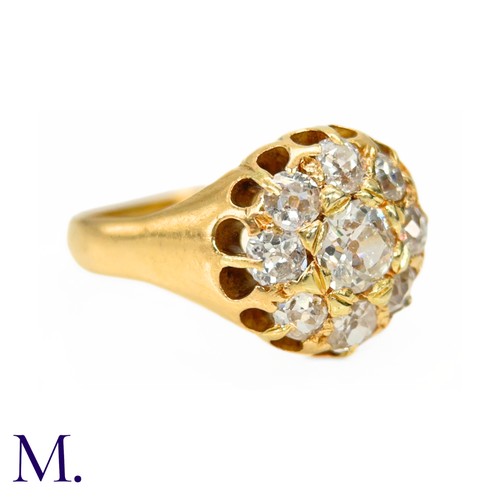 76 - A Victorian Diamond Cluster Ring. 

The antique 18ct yellow gold ring is set with nine old cut diamo... 