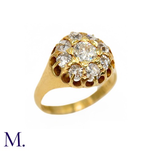 76 - A Victorian Diamond Cluster Ring. 

The antique 18ct yellow gold ring is set with nine old cut diamo... 