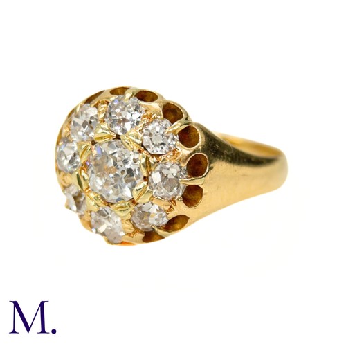 76 - A Victorian Diamond Cluster Ring. 

The antique 18ct yellow gold ring is set with nine old cut diamo... 