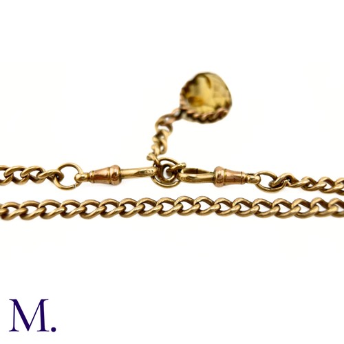 93 - An Antique Albert Chain with Citrine Spinning Fob.

The antique 9ct rose gold albert chain is secure... 