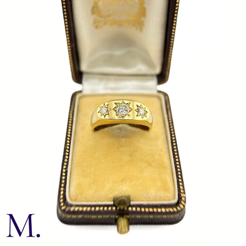 78 - A Diamond Gypsy Ring.

The 18ct yellow gold gypsy ring is set with three round cut diamonds weighing... 