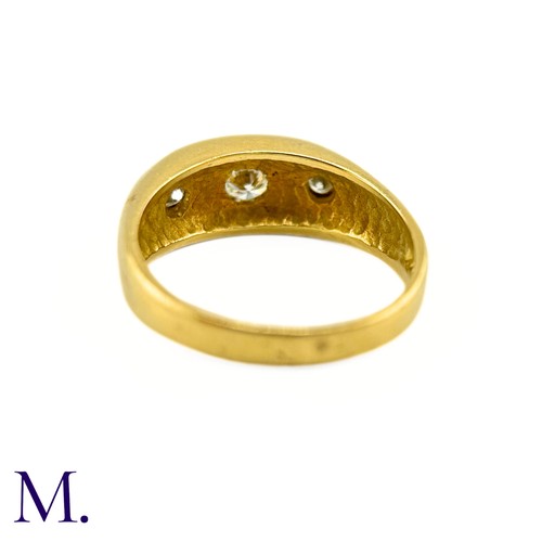 78 - A Diamond Gypsy Ring.

The 18ct yellow gold gypsy ring is set with three round cut diamonds weighing... 