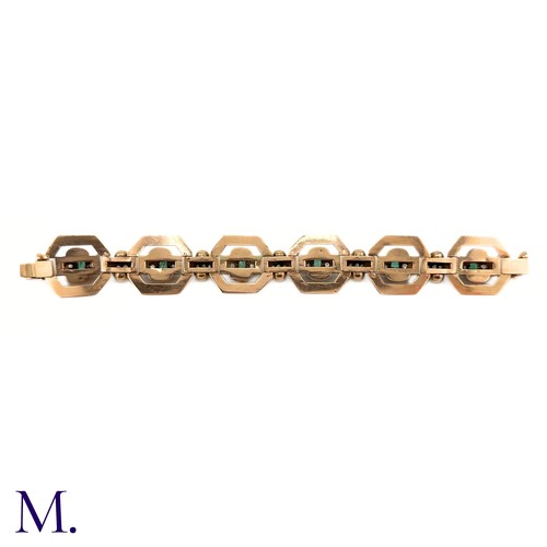 83 - An Antique Emerald and Diamond Bracelet.

The rose gold bracelet is set with six square/rectangular ... 