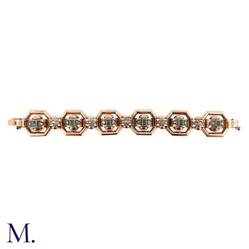 83 - An Antique Emerald and Diamond Bracelet.

The rose gold bracelet is set with six square/rectangular ... 