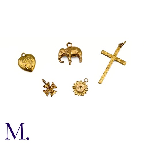 27 - Five 9ct Gold Charms

The lot includes various charms including a heart, a cross, an elephant and tw... 