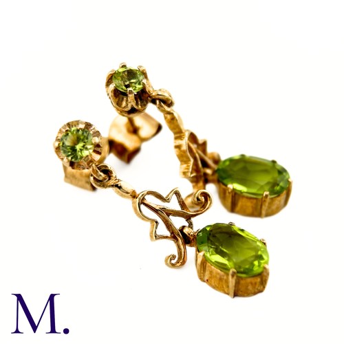 26 - A Pair of Antique Peridot Earrings

The peridot earrings are set in 9ct yellow gold. The earrings ar... 