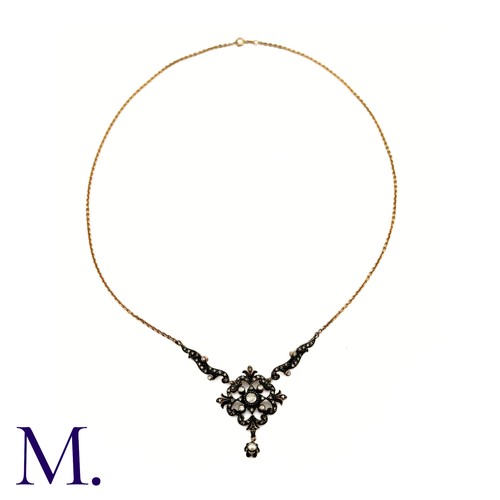 50 - A Rose Diamond Necklace
The rose diamond pendant hangs from a 48cm later 14ct gold chain.  The large... 