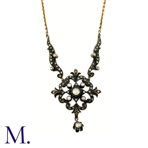 50 - A Rose Diamond Necklace
The rose diamond pendant hangs from a 48cm later 14ct gold chain.  The large... 