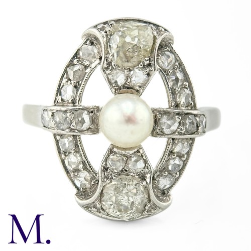 57 - An Art Deco Pearl and Diamond Ring

The 18ct white gold openwork ring is set with a pearl to the cen... 