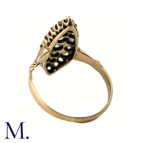 31 - An Antique Diamond Marquise Ring

The marquise ring is set with approximately 1.0ct of old cut diamo... 