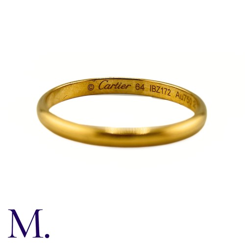 97 - An 18ct Gold Cartier Band

The 18ct gold band is by Cartier - it is signed and numbered.

Weight: 2.... 