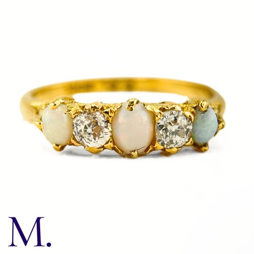 114 - An Antique Opal and Diamond Ring

The 18ct yellow gold ring is set with three oval opals with good c... 